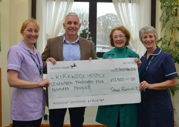 TREK CASH: Steve Burnhill and his mother with Kirkwood Hospice workers Sarah Wright and Elaine Gill.