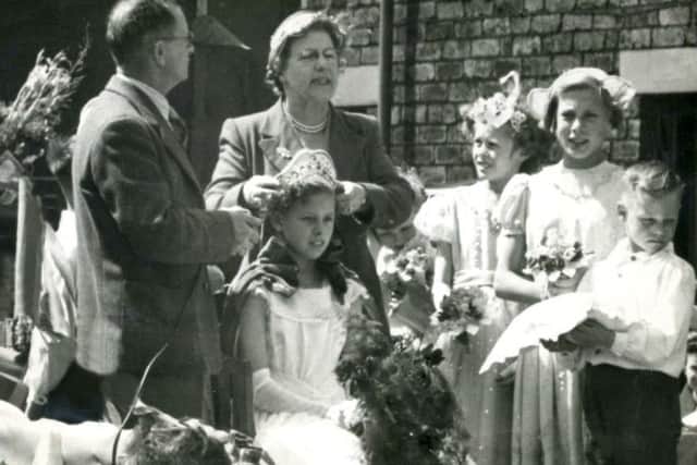 WHIT CELEBRATION: Mrs Palin crowns Joan Cockcroft Queen of Granville Street Chapel.