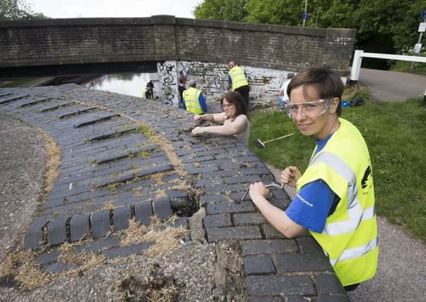The Canal and River Trust is hoping groups will go the extra mile on the Calder and Hebble canal.