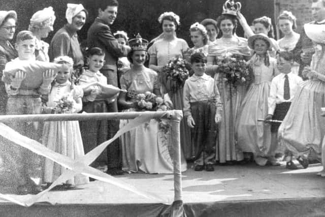 CROWNING GLORY: A young Anthony Newley crowns Miss Ann Elizabeth Gray as the festival queen for St Saviours Church, Birstall.