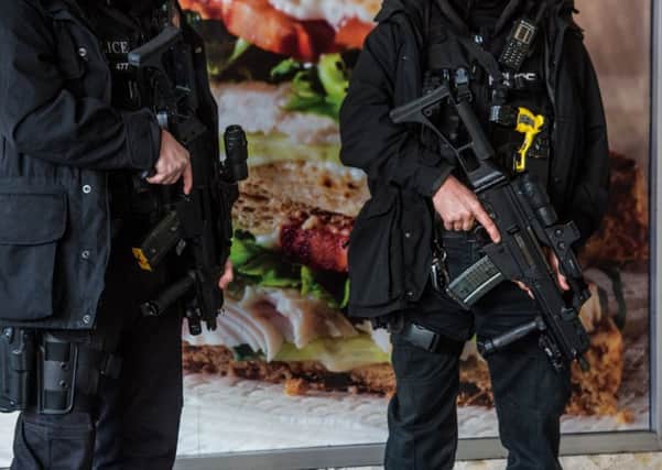 Extra armed police were on the streets of West Yorkshire today after the attack in Manchester. Picture shows officers in Leeds earlier this year.