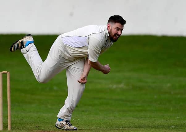Hopton Mills bowler Michael Carroll sends down a delivery during his sides game against Altofts last Saturday.