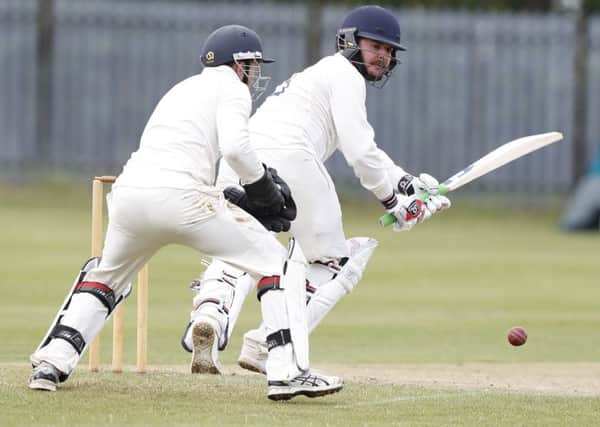 Cleckheatons Ian Nicholson clips the ball away during his innings  against Townville last Saturday.