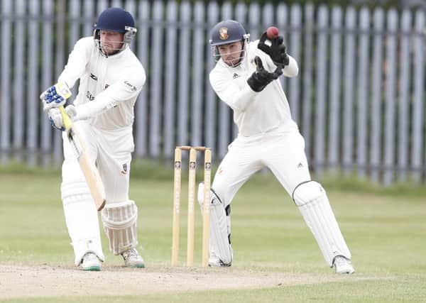 Cleckheaton opener Nick Lindley struck a splendid 110, which included five sixes and 11 fours, but Cleckheaton had to settle for a tie in a bizarre game away to Townville, which saw the Duckworth Lewis Stern method introduced. Pictures: John Clifton