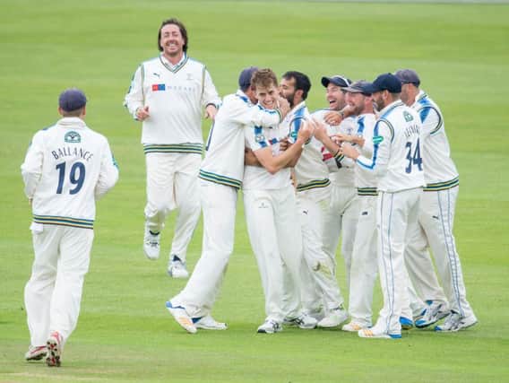 Yorkshire players celebrate as Ben Coad takes one of his six wickets (Photo: SW Pix)