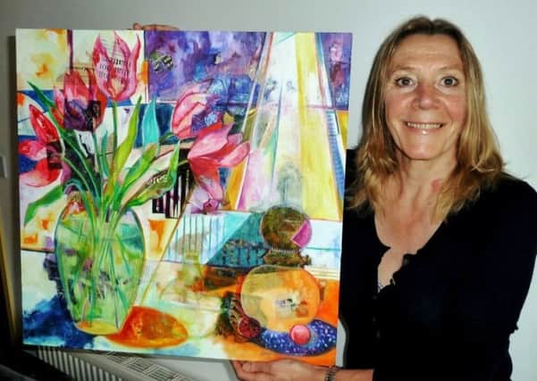 NEW EXHIBITION: Cleackheaton artist Josie Barraclough with one of her paintings.