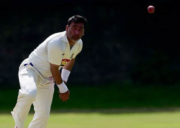 Mohammed Shahnawaz bowling for Batley against New Farnley in the Bradford Premier League.
