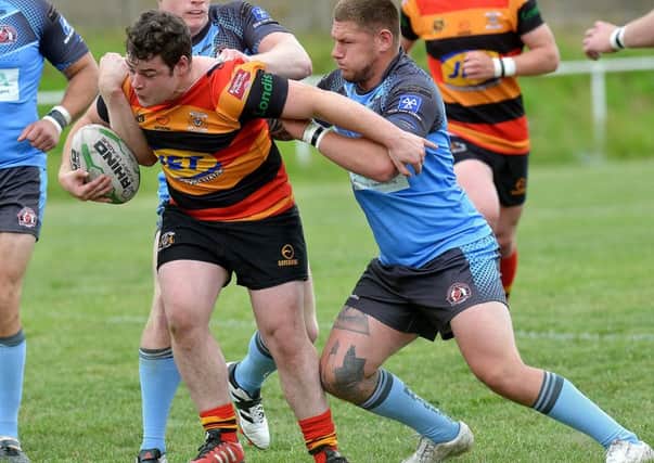 Shaw Cross look to mount an attack during last Saturdays controversial victory over Normanton Knights, which boosts their hopes of reaching the play-offs.