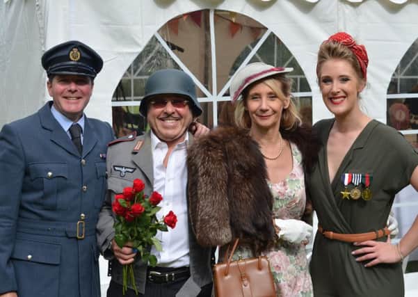 Fundraisers: From left, Darren Brooke , Peter Morgan (and inset) and Jackie Brooke at a 1940s fundraiser held last year.