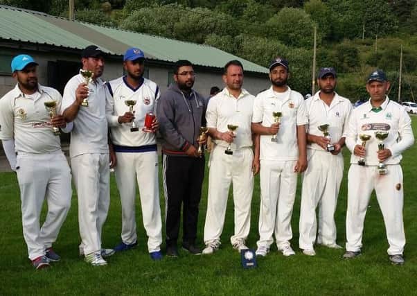 New Sanam celebrate winning the Dewsbury District League six-a-side competition last Sunday.