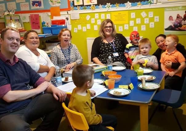 TEA PARTY: Children at Childs Play Nursery in Dewsbury meet their new teachers.