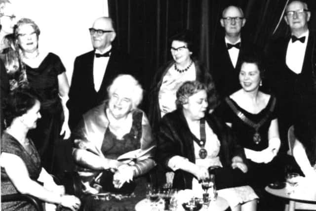 MIRFIELD PARTY: Members and guests of the Dewsbury Soroptimist Club pictured at the groups 20th birthday party at the Marmaville Club, Mirfield in 1962. Pictured second from the right, front row, is Mrs Joan Cave, a former president wearing her chain of office.
