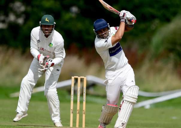 Shoukat Ali top scored with 48 as Scholes inflicted an 87-run defeat on promotion rivals Wrenthorpe as they retunred to the top of Allrounder Bradford League Championship One. Pictures: Paul Butterfield.