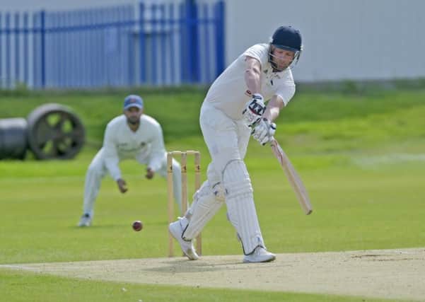 Nick Connolly became the first Hanging Heaton batsman since 1980 to score 1,000 Bradford League runs in a season as his 75 helped them to victory over Cleckheaton last Saturday to put the Bennett Lane men on the brink of  winning the Premier Division title. Picture: Steve Riding