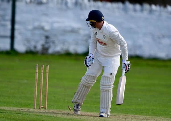 Gomersal's Richard Wear is bowled during last Saturday's Championship One game against Bowling Old Lane.