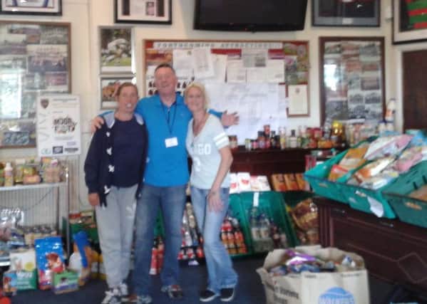 Food In Bellies Not Bins project expanding at Dewsbury Moor. Pictured are some of the volunteers who run it.