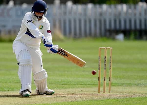 Sam Gatenby hit a maiden Bradford League ton to help Scholes inflict an emphatic victory on Ossett and move seven points clear of Methley at the top of Championship One.