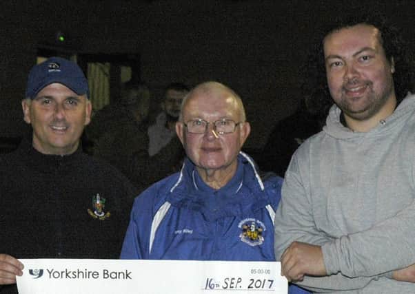 Callam Wraight of Shrewsbury (far right) claimed the 1,000 first prize after defeating Audenshaws Graeme Wilson (left) to win the Brighouse Classic last Saturday. Pictured with competition organiser Tony Riley (centre). Picture: David Burns