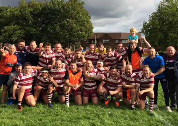 Thornhill Trojans celebrate winning promotion to National Conference Division One following last Saturdays 35-16 victory away to Wigan St Judes in their final game of the season.