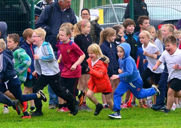 Local primary school children take part in the St John Fisher Schools Partnership Cross Country event.