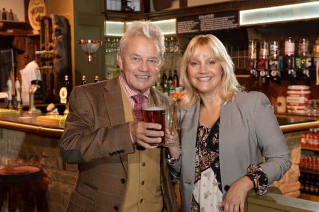 Malandra Burrows (Kathy Glover) and Frazer Hines (Joe Sugden) celebrate Emmerdale's 45th anniversary.  Picture: Bruce Rollinson