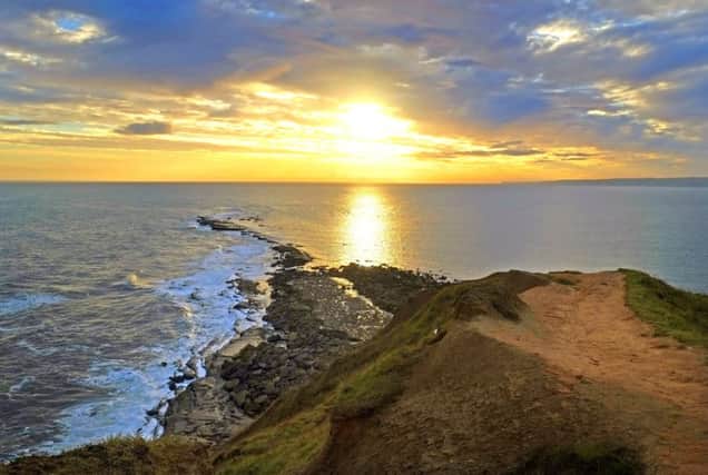 An alarm that replicates sunrise could be the answer to the winter blues. Filey Brigg by Tony Johnson.