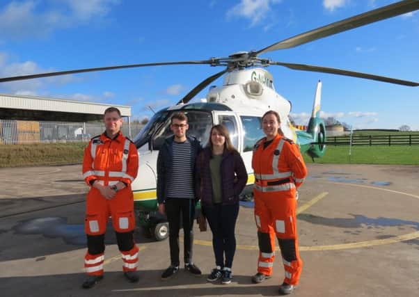 Reunited: Jack and Joanna with, in uniform, paramedic Andy Dalton and Dr Laura Duffy