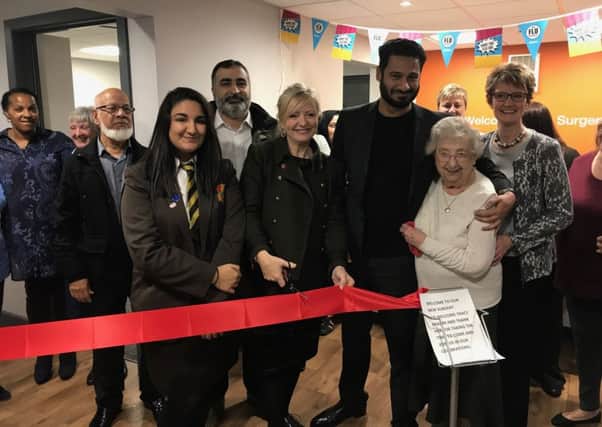 Cook Lane:  MP Tracy Brabin cuts the ribbon with Dr Jabbar and Dr Khan, practice manager Melanie Lockwood with patients from the surgery