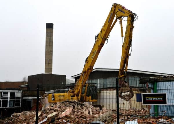 Going: Demolition work is now under way at the old Whitcliffe Mount site