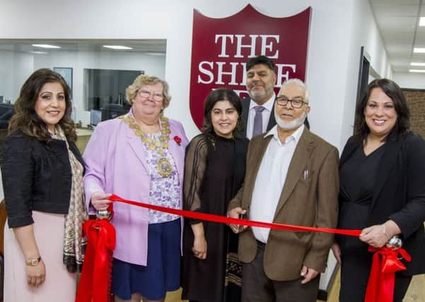 RED TAPE DAY: Fara Butt, mayor Christine Iredale, Baroness Warsi, Sajid Butt, Sadfar Hussain and MP Paula Sheriff at the official opening.