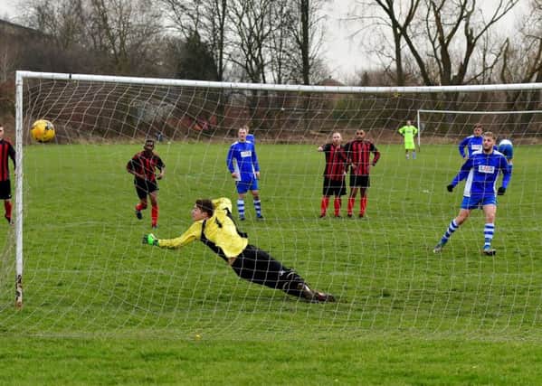 Hanging Heaton's Joe Jagger slots a 0penalty into the top corner on his way to scoring five goals against Wellington Westgate last Sunday.