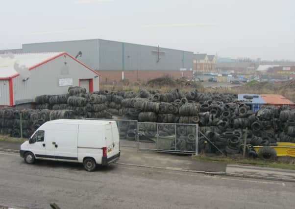 Tyres piled up at the site