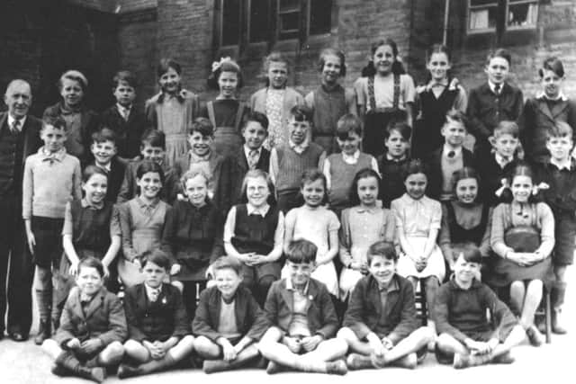 War babies: Children of Knowles Hill School, Dewsbury Moor, pictured after the war in 1947. Most of those pictured were born just before the war or during the conflict. Peter Gibbard is third from the right (the lad wearing the tie) on the third row.