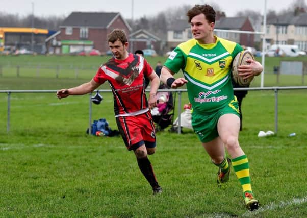 Simeon Torr bagged a hat-trick of tries as Hanging Heaton recorded an emphatic 90-0 victory over Cowling Harlequins to maintain their march towards the Pennine League Division Two West title. Picture: Paul Butterfield.