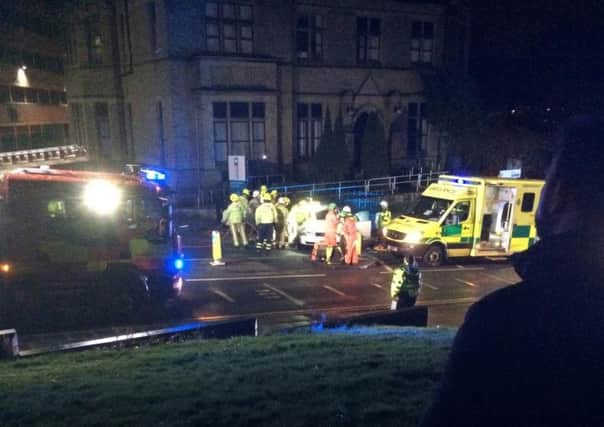 Emergency services at the scene of the crash in Halifax Road, Dewsbury, last night. Picture courtesy of Sad Ajaj