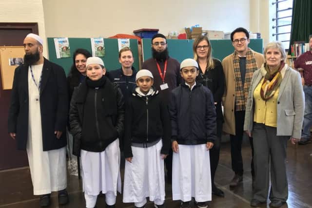 Children from the Institute of Islamic Education, Cambridge Street School, Birstall Primary Academy, Eastborough School, and Madni Academy with representatives from Tesco, Karen Rowley from Paula Sherriffs office, and Councillor Vivienne Kendrick.