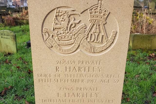 CORRECT DATE: The new headstone for the Hartley brothers.