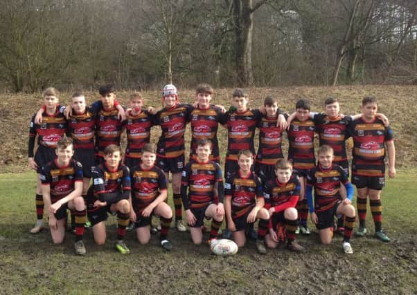 Shaw Cross Sharks Under-14s overcame a tough test from Brighouse to secure victory in their first game of the season.