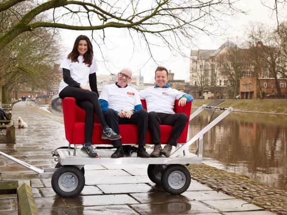 BBC Look North presenters Amy Garcia, Harry Gratian and Paul Hudson take a rest ahead of their Big Sofa Challenge