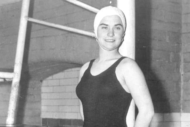 RENOWNED SWIMMER: Eileen Fenton can still step into the costume she wore when she swam the English Channel.