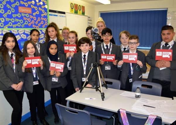 BUDDING REPORTERS: Thornhill Community Academy students ready for action in the newsroom.