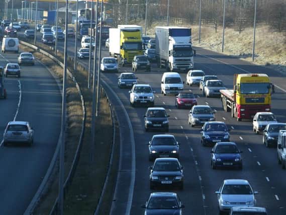 The two men died when their car was hit on the M62.