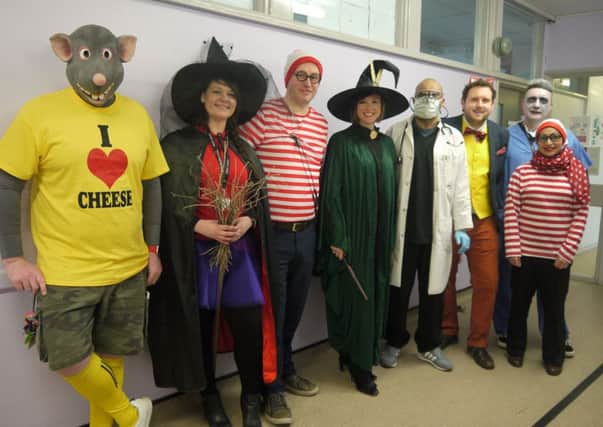 CLASS CELEBRATIONS: Staff at Upper Batley High School dress up for World Book Day.