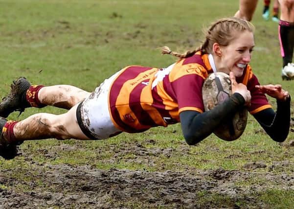 Caitlin Beevers dives over for Dewsbury Moor's first try in their Challenge Cup final against Wigan St Pats.