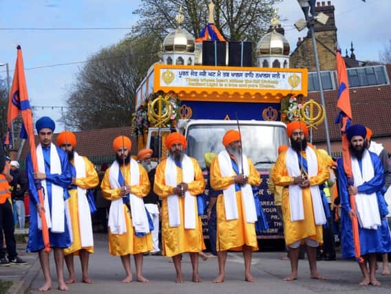 Sikhs from the Gurdwara Temple taking set off for the Vaisakhi Parade from the temple into Leeds City Centre