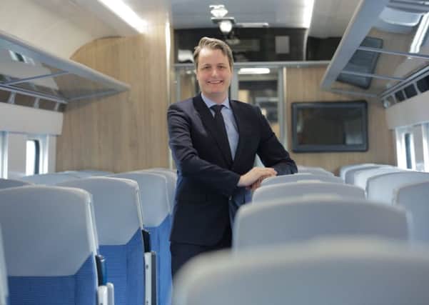 FUTURISTIC OUTLOOK: Leo Goodwin, managing director for TransPennine Express, is pictured on the new Nova 3 train.