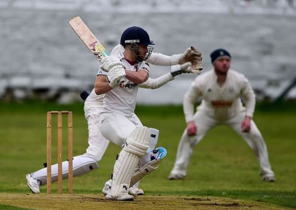 Morley batsman James McNichol in action against Gomersal on the opening day of the Bradford League season last Saturday.