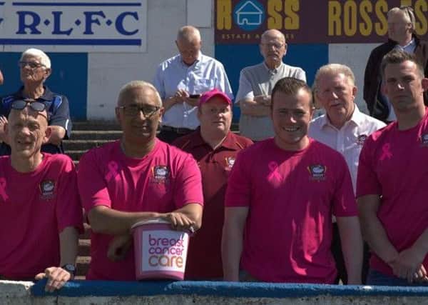 Bulldogs fans pictured at Barrow after completing their 105-mile sponsored walk.