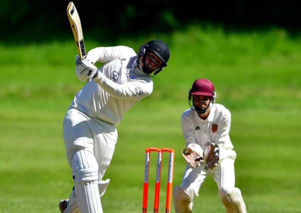 Paul Sauer hits out on his way to a score of 32 for Crossbank Methodists during their Heavy Woollen Cup second round tie against Methley last Sunday.